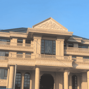 铜川黄金麻别墅外墙干挂石材效果示例