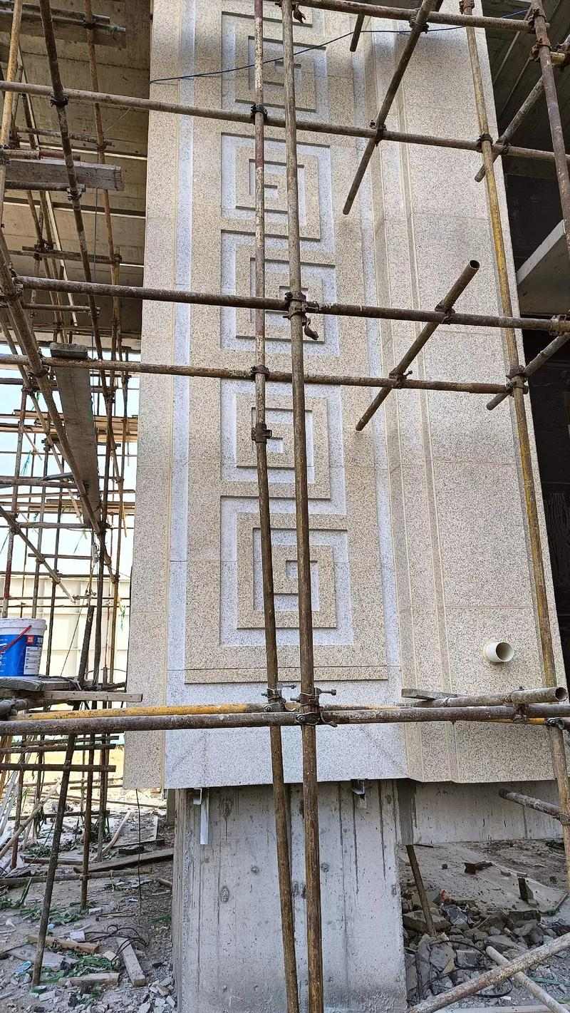 铜川 黄金麻花岗岩别墅外墙干挂回纹造型效果