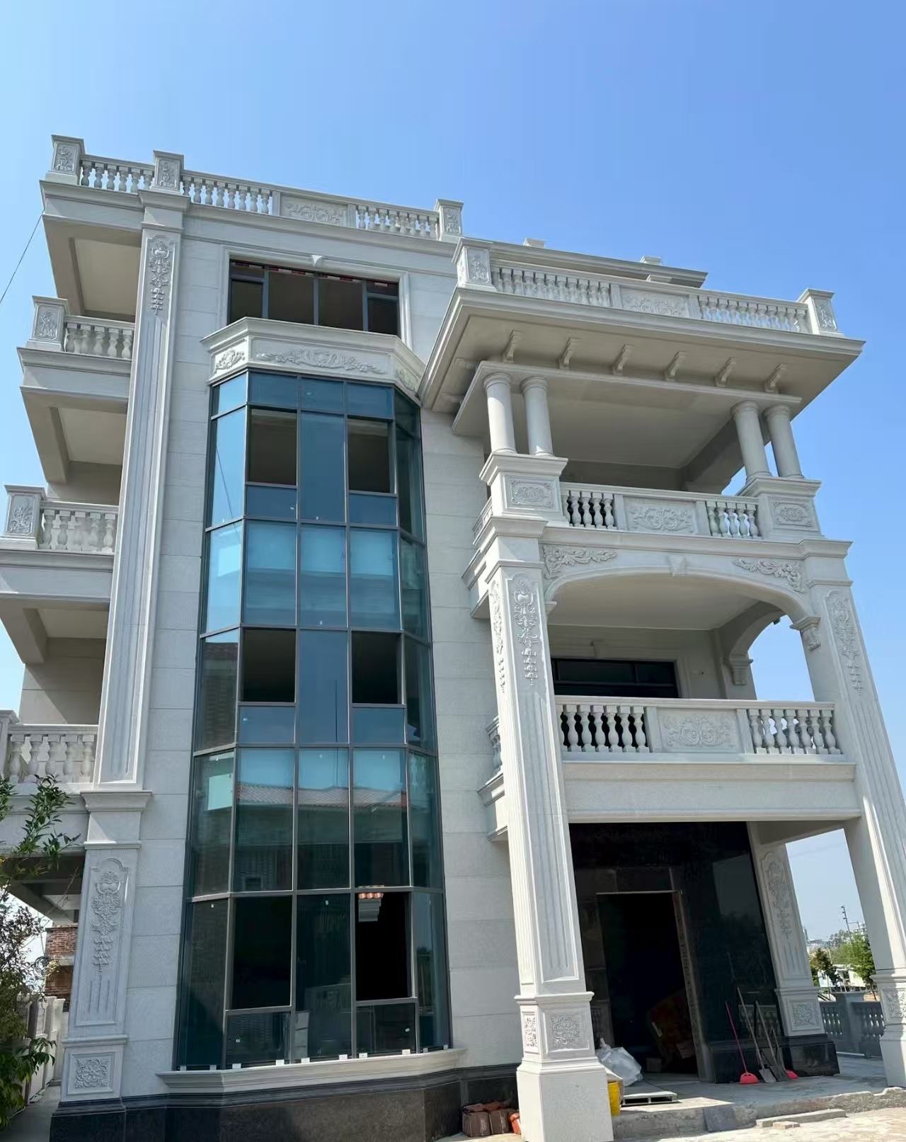 铜川 白麻花岗岩别墅外墙干挂效果展示