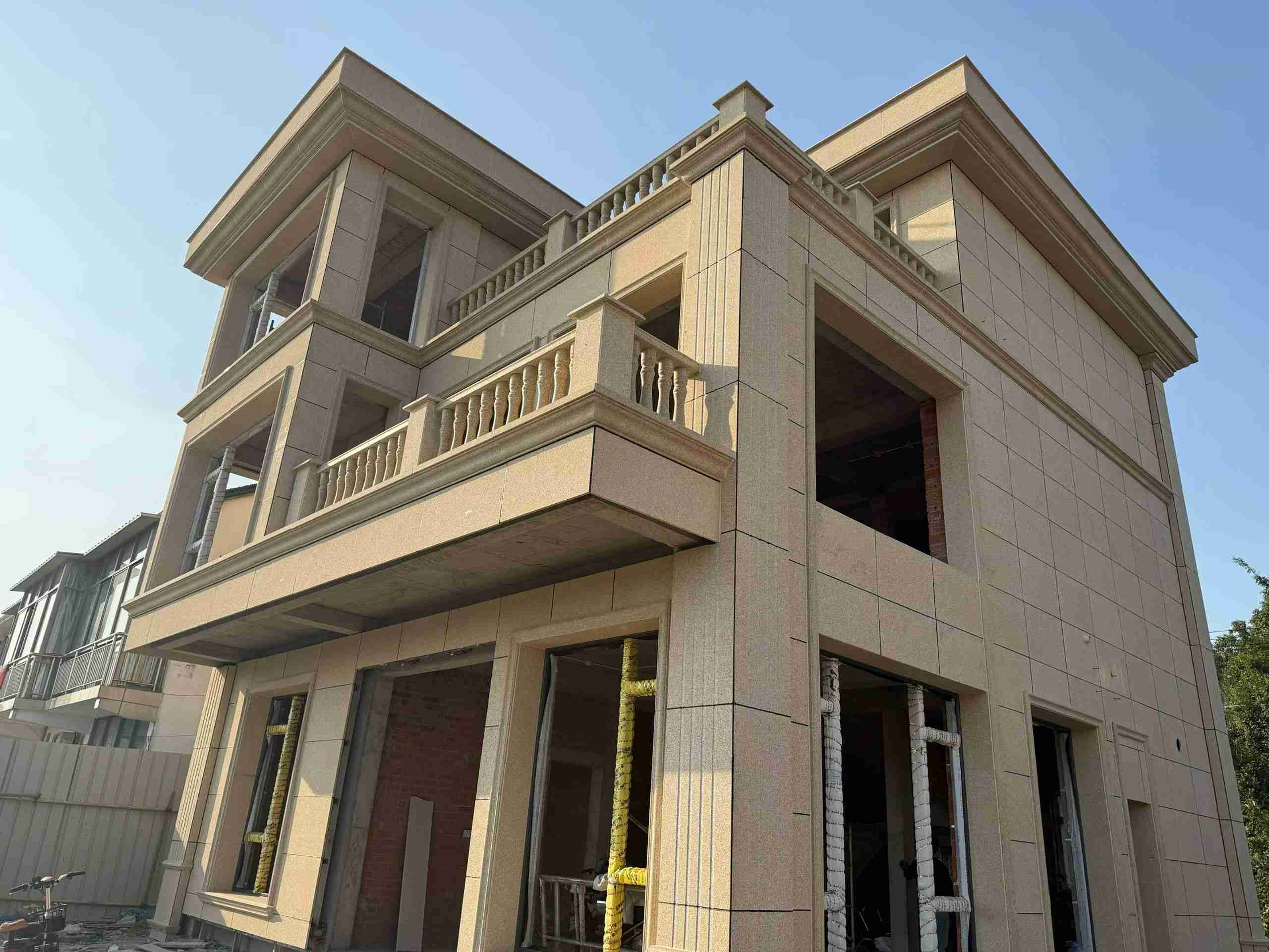 铜川 黄金麻花岗岩石材荔枝面外墙干挂效果展示